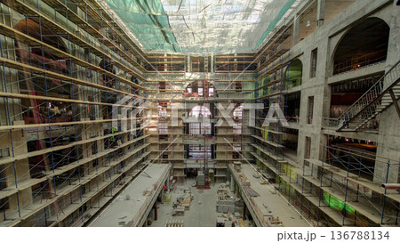 Construction equipment material with scaffolding and tools inside the floor of high rising building timelapse Construction equipment material with scaffolding and tools inside the floor of high rising building timelapse 136788134