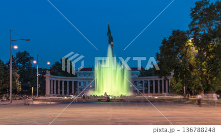 The heroes monument of the red army in schwarzenbergplatz day to night timelapse at night with colorful light fountain in vienna, austria 136788248
