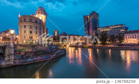 Urania and Danube Canal day to night timelapse in Vienna. Urania and Danube Canal day to night timelapse in Vienna. 136788250