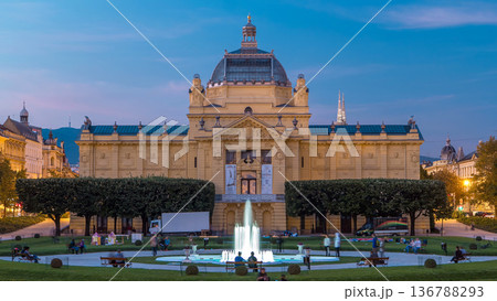 Day to night timelapse view of Art pavilion at King Tomislav square in Zagreb, Croatia. 136788293