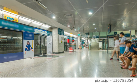 Passengers waiting for metro train in Singapore Mass Rapid Transit MRT timelapse. Passengers waiting for metro train in Singapore Mass Rapid Transit MRT timelapse. 136788354