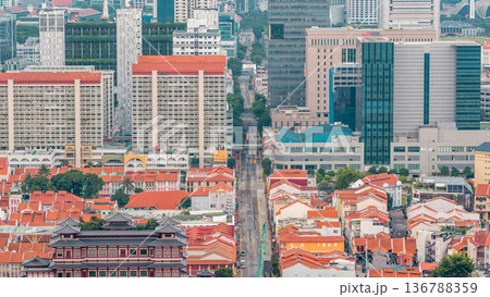 Aerial view of Chinatown and Downtown of Singapore in the evening timelapse Aerial view of Chinatown and Downtown of Singapore in the evening timelapse 136788359