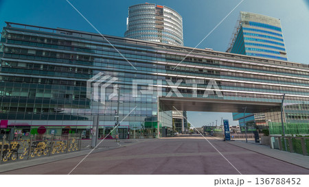 Donaustadt Danube City timelapse hyperlapse is a modern quarter with skyscrapers and business centres in Vienna, Austria. 136788452