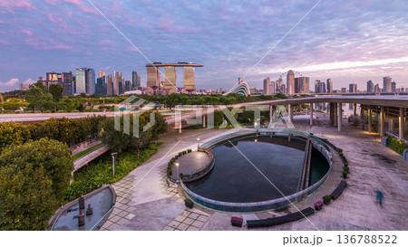 Panorama of Singapore with Gardens by the bay night to day timelapse before sunrise 136788522
