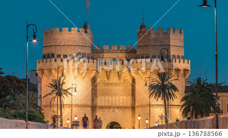 Serrans Towers or Torres de Serranos day to night timelapse in Valencia, Spain. Serrans Towers or Torres de Serranos day to night timelapse in Valencia, Spain. 136788566