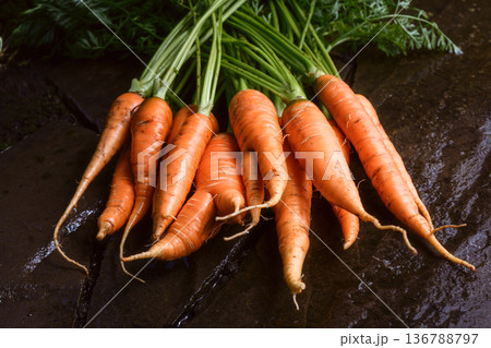 Fresh carrots with soil traces 136788797