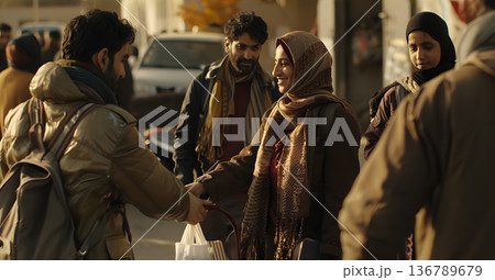 World Reefugee Day, A touching reunion scene where refugees are welcomed into a host community 136789679