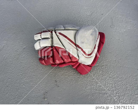 hockey glove on the gray background 136792152