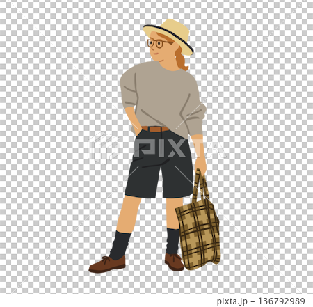 A woman in casual clothes carrying a handbag 136792989
