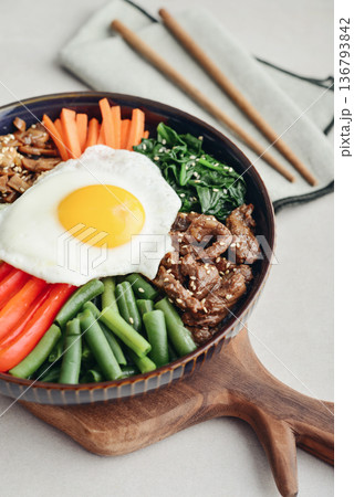 Bibimbap on a concrete background 136793842