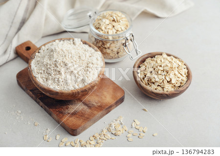 Oat flour in wooden bowl Oat flour in wooden bowl 136794283