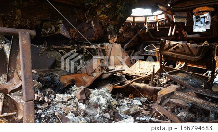 Rusty and burned-out armored vehicles on ukrainian territory. Exhibition of destroyed military equipment of the russian army. War between Ukraine and russia. Close up Slow motion 136794383