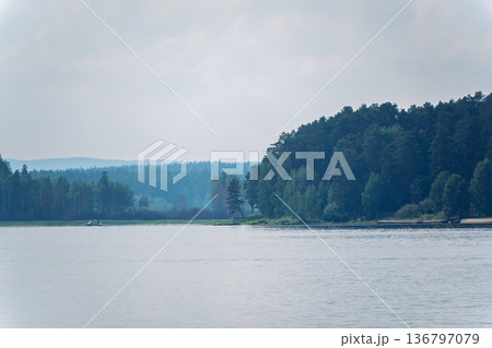 Blue lake with cloudy sky, natural background Blue lake with cloudy sky, natural background 136797079