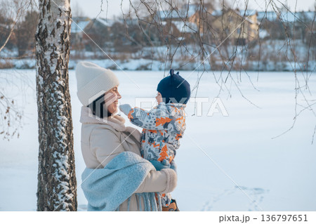 Mother and Baby in Winter Wonderland Mother and Baby in Winter Wonderland 136797651