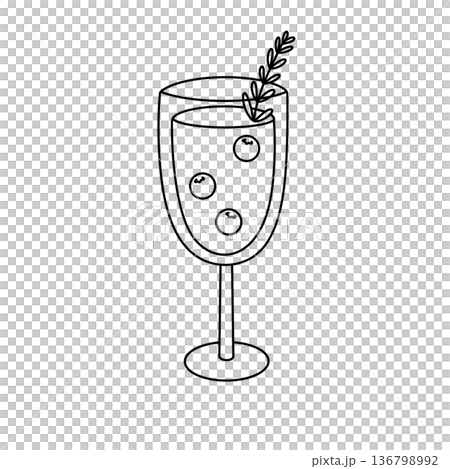 A glass of wine with berries on top 136798992