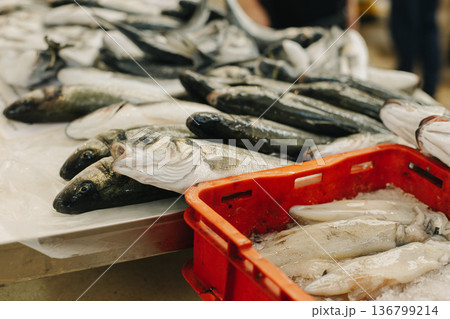 Fresh fish on ice at the traditional fish market. 136799214