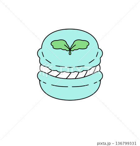 A blue pastry with a green leaf on top 136799331