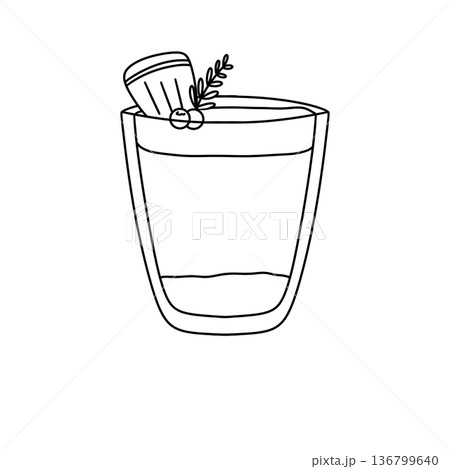 A glass of drink with a garnish on top 136799640