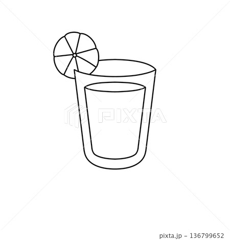 A glass of liquid with a slice of lime on top 136799652
