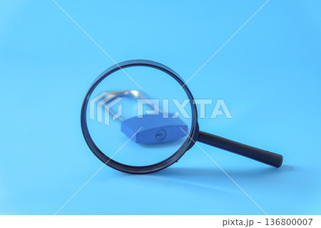 A magnifying glasses to lock on background.A magnifying glasses to lock on background. 136800007
