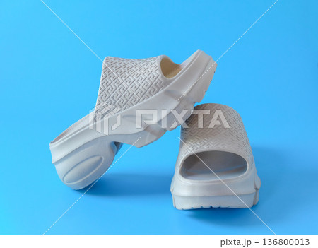 A pair of slippers or flip flops with background, A pair of slippers or flip flops with background, 136800013