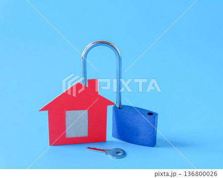 Mini red house and lock on background. Mini red house and lock on background. 136800026
