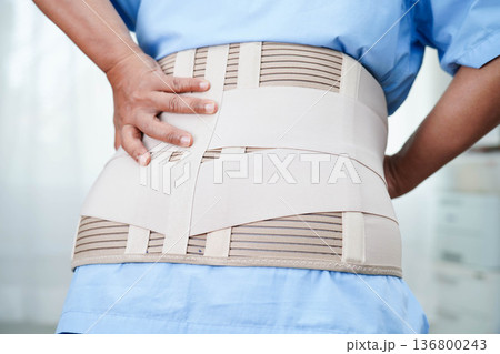 Asian senior pain back wearing elastic support belt with walker. Asian senior pain back wearing elastic support belt with walker. 136800243