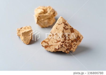 brown sugar cubes on white background 136800780