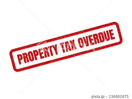 Distressed red rubber stamp impression indicating property tax is overdue with granular texture 136802875