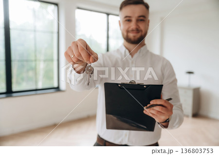 Real estate agent is in the new room Real estate agent is in the new room 136803753