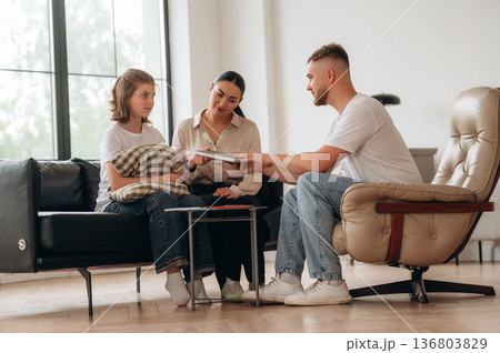 Issues solving, helping. Mother with her daughter are at psychologist appointment Issues solving, helping. Mother with her daughter are at psychologist appointment 136803829