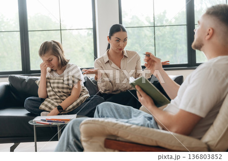 Mental breakdown, girl is crying. Mother with her daughter are at psychologist appointment 136803852