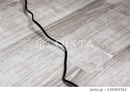 Household scene showing cable safety with minimal modern interior design and visible grain Household scene showing cable safety with minimal modern interior design and visible grain 136804562