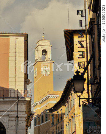 Sunlit Mediterranean Clock Tower Alley Architectural Travel Scene 136805025