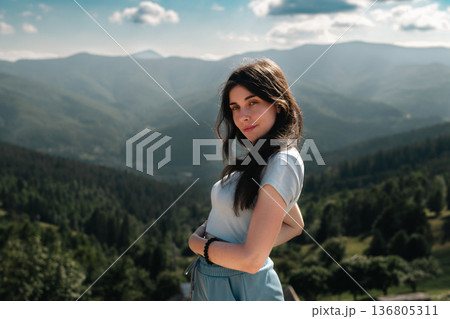 Young Woman Enjoying Mountain View in Summer 136805311