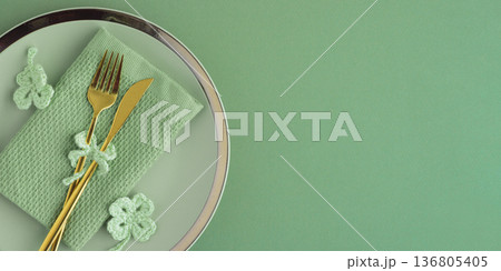 Saint Patrick Day Table Setting with Clover Decor. Festive Green Arrangement 136805405