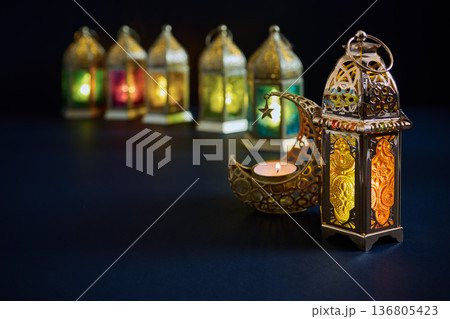Ramadan kareem background with glowing lanterns and crescent moon Ramadan kareem background with glowing lanterns and crescent moon 136805423