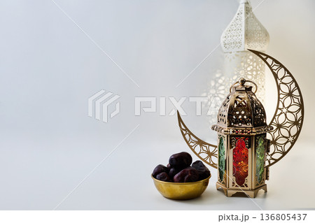 Ramadan kareem concept with traditional lantern, dates, and crescent moon Ramadan kareem concept with traditional lantern, dates, and crescent moon 136805437