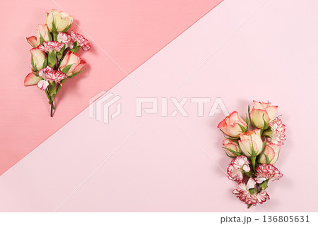 Arrangement of flowers on a pink isolated background, place for text, flat lay. Creative modern bouquet, minimal holiday and spring concept. Greeting card for Women's Day or Valentine's Day, happy Arrangement of flowers on a pink isolated background, place for text, flat lay. Creative modern bouquet, minimal holiday and spring concept. Greeting card for Women's Day or Valentine's Day, happy 136805631
