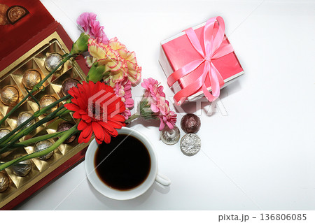 Beautiful flowers and butterflies on a light background.Abstract floral composition, still life, spring background or banner, holiday concept. Card for Mother's Day, Women's Day, Happy Birthday, 136806085