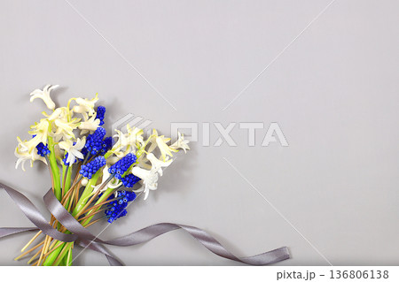 Abstract floral composition, still life, spring background or banner, Beautiful blooming hyacinths and muscari on a light background.holiday concept. Card for Mother's Day, Women's Day, Happy Abstract floral composition, still life, spring background or banner, Beautiful blooming hyacinths and muscari on a light background.holiday concept. Card for Mother's Day, Women's Day, Happy 136806138