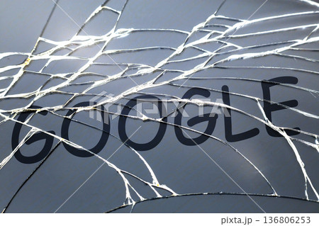 Broken cracked glass with word "Google" on it. 136806253