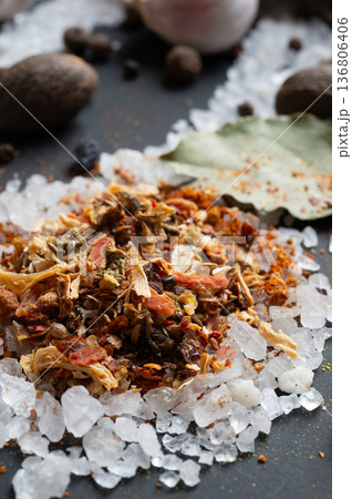 seasonings background with salt, Spices served at black. natural meal additives. healthy food concept. extreme macro shot seasonings background with salt, Spices served at black. natural meal additives. healthy food concept. extreme macro shot 136806406