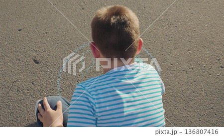 Clean planet Earth, boy child draws chalk asphalt, Kid child baby boy, Eco awareness from youth, creative world learning, outdoor play with message, chalked life lesson, small act big meaning, vibrant 136807416