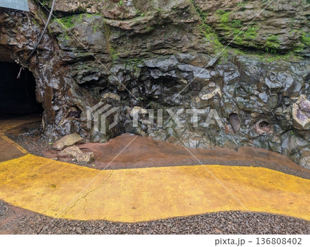 Misiones, Argentina - June 23, 2025: Minera Vanda or the Vanda Mines in Misiones, Argentina. A hiking trail along a wall with geodes. 136808402