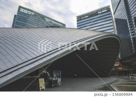 Nov 25 2025 Modern City Architecture With Large Curved Metal Roof Nov 25 2025 Modern City Architecture With Large Curved Metal Roof 136809984