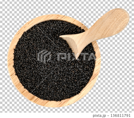 Top view of black basil seeds in a round wooden bowl with a wooden scoop. Healthy organic superfood, sabja seeds, isolated. Professional food photography for spice packaging. 136811791