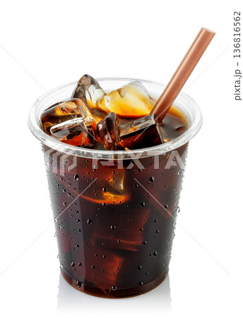 Iced coffee in fogged disposable plastic cup with straw isolated on white background Iced coffee in fogged disposable plastic cup with straw isolated on white background 136816562