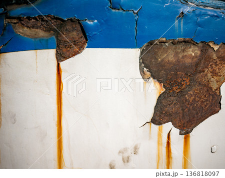 Peeling Paint on Old Metal Surface with Yellow Hinge and Rust Damage 136818097