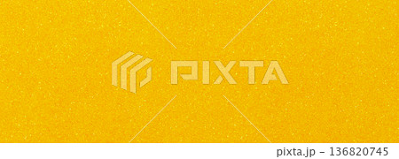 Golden yellow textured background creating a sparkling effect 136820745